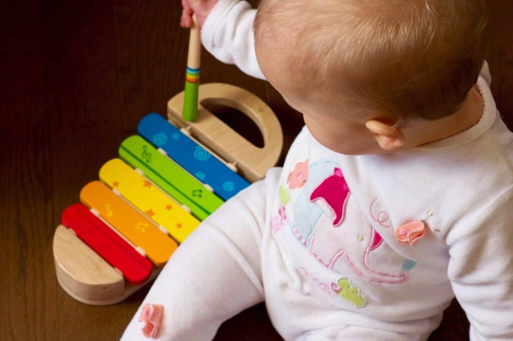 eat play sleep routine
baby playing instrument
baby routine